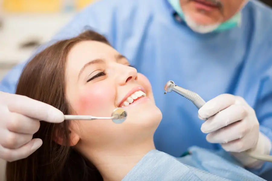 Patient getting dental work in Lancaster, CA