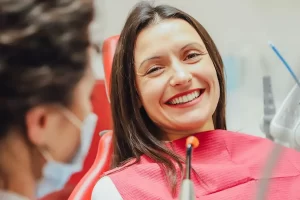 Female patient smiling in dental office