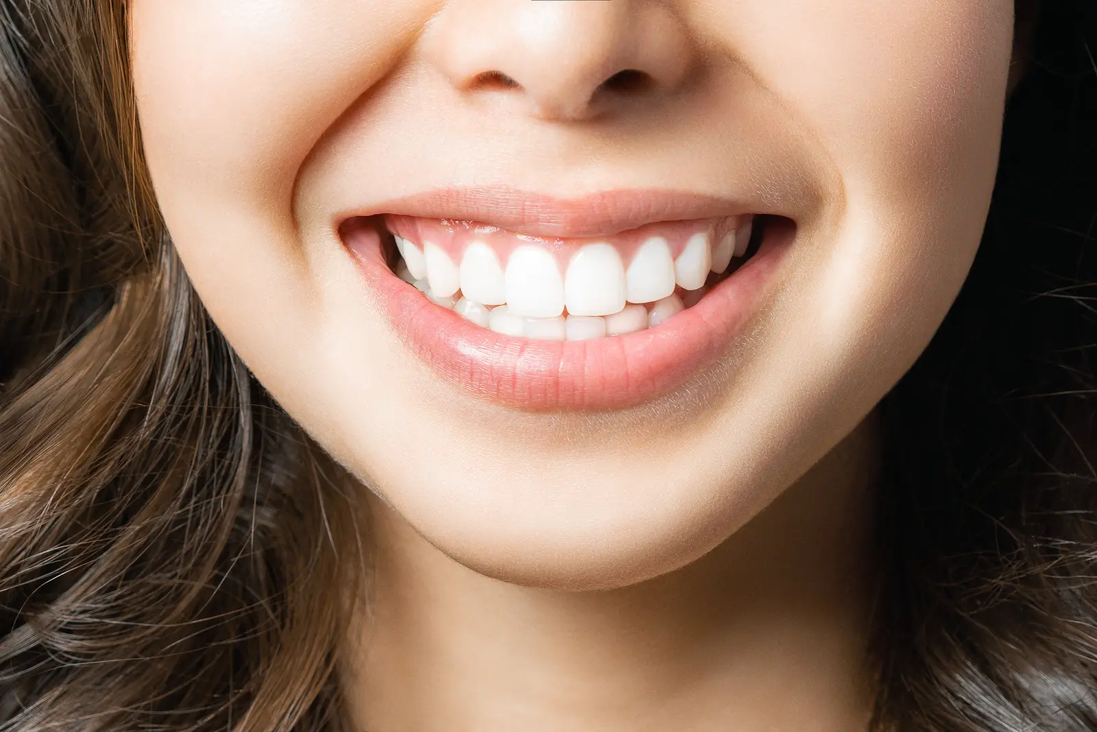 Dental patient showing her beautiful smile in Lancaster, CA